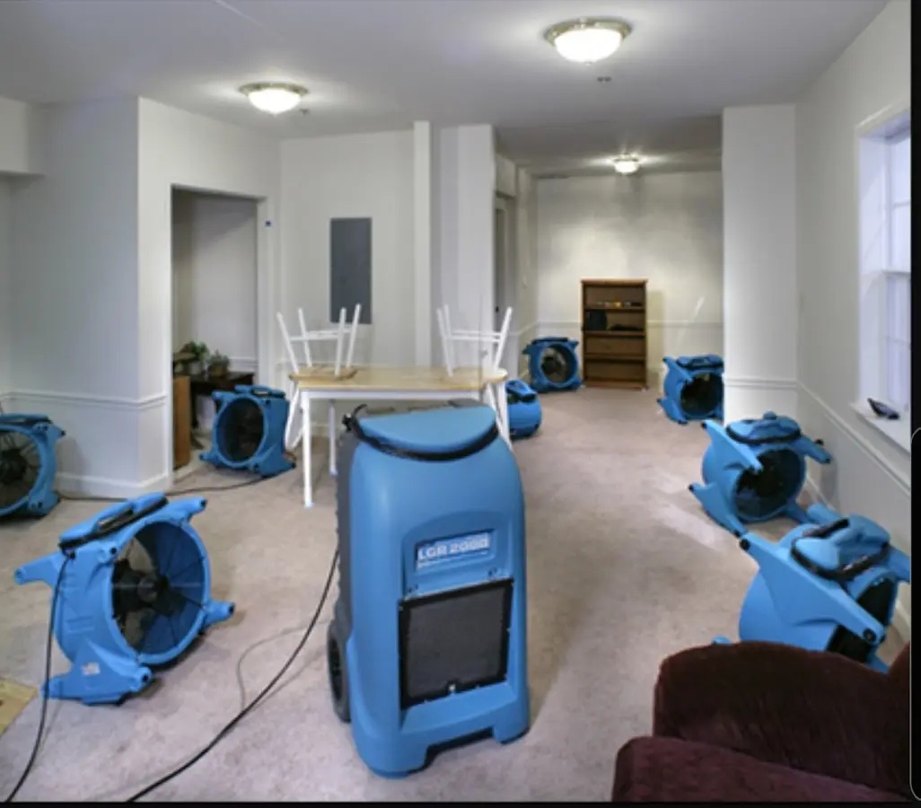 Air movers and dehumidifier setup for Water Damage Restoration in Cottage Lake